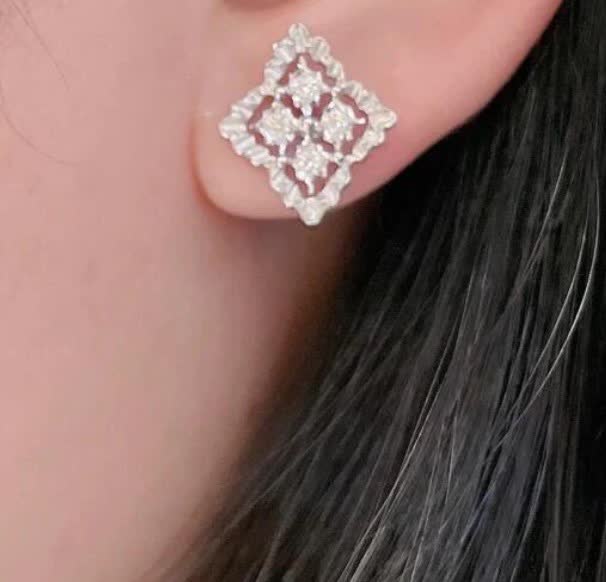 Van Cleef & Arpels Elegant Silver Stud Earrings with Diamond Accents